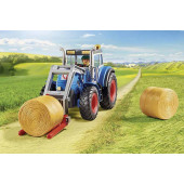 Large tractor with accessories.